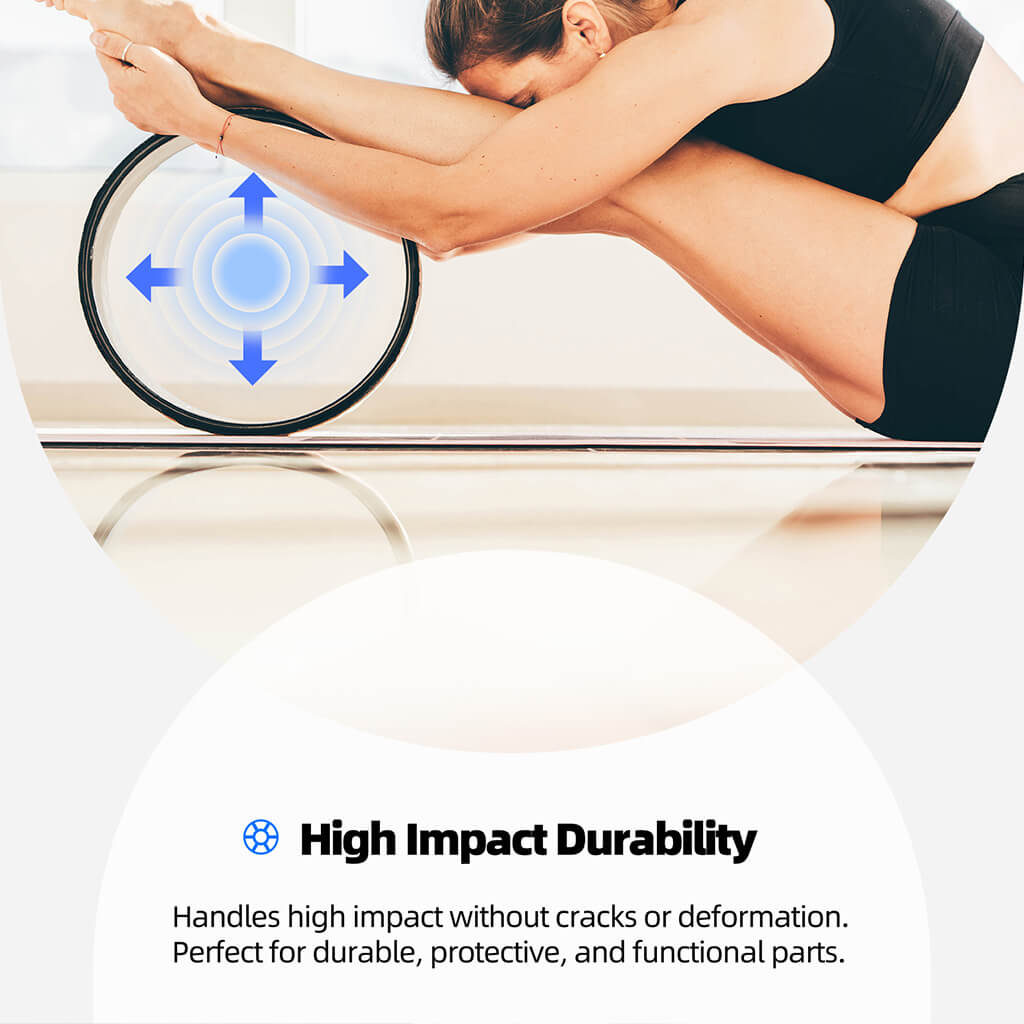 Person on a black-and-white fitness wheel during stretching or exercise