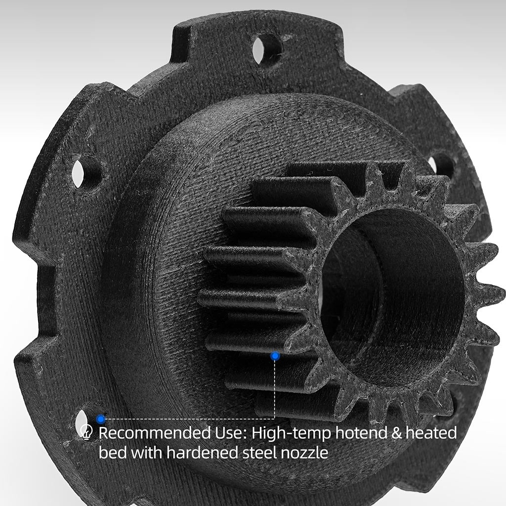 Black 3D-printed gear with textured surface and nozzle wear detail