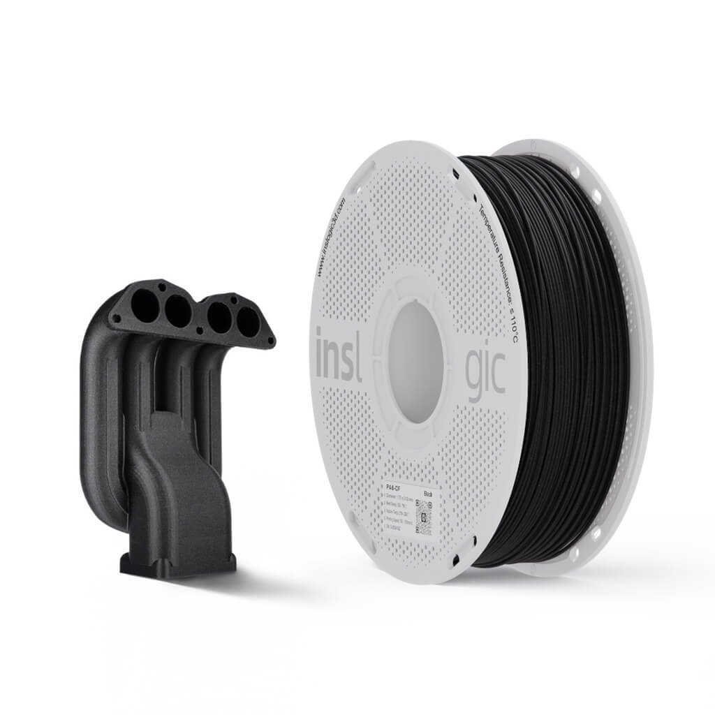 Black PA6-CF carbon fiber printed bracket piece beside filament spool