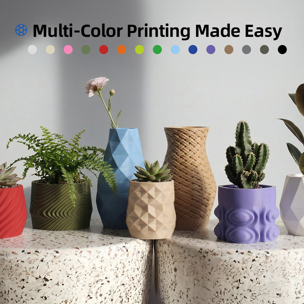 Multi-color 3D-printed plant pots with succulents and flowers